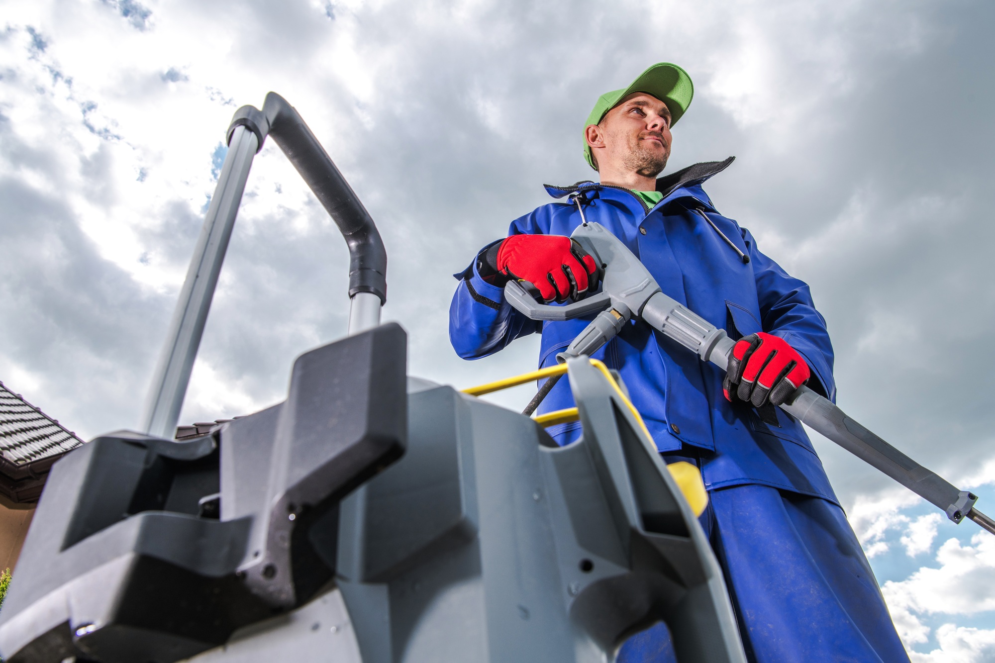 Worker with Pressure Washer